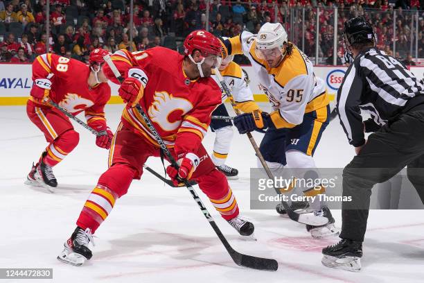 Nazem Kadri f the Calgary Flames faces off against Matt Duchene of the Nashville Predators at Scotiabank Saddledome on November 3, 2022 in Calgary,...