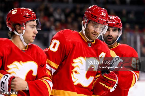 Calgary Flames Left Wing Jonathan Huberdeau and Calgary Flames Center Nazem Kadri talk between whistles during the second period of an NHL game...