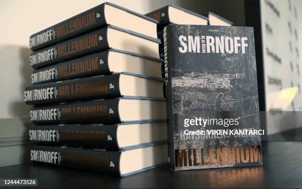 Photo taken on November 3, 2022 shows copies of the new 'Millenium' novel by Swedish author Karin Smirnoff in Stockholm. - A new entry to the Nordic...