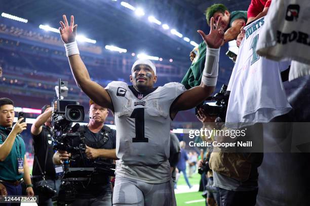 Jalen Hurts of the Philadelphia Eagles celebrates as he runs off the field after defeating the Houston Texans at NRG Stadium on November 3, 2022 in...