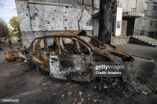 View of a burned car and a damaged building after the Russian missile attacks in Mykolaiv, Ukraine on November 03, 2022.