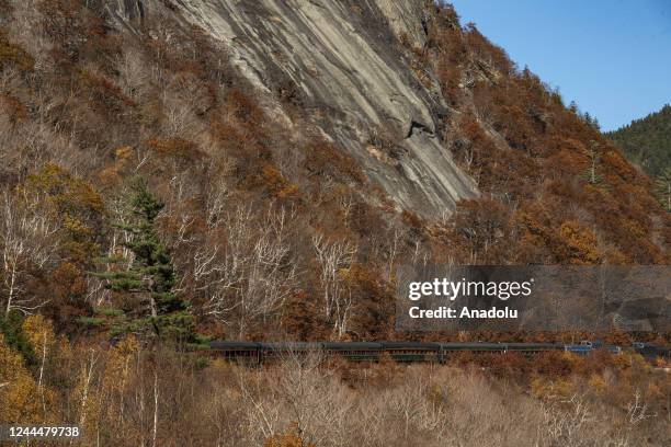 Special 470 Club chartered Conway Scenic Railroad Rail Fan train makes it way through Crawford Notch in Crawford Notch State Park, in North Conway,...