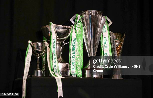 The Scottish Premiership Trophy, the Scottish League Cup and the Womens Scottish Cup during the 2022 Celtic Annual General Meeting at Celtic Park, on...