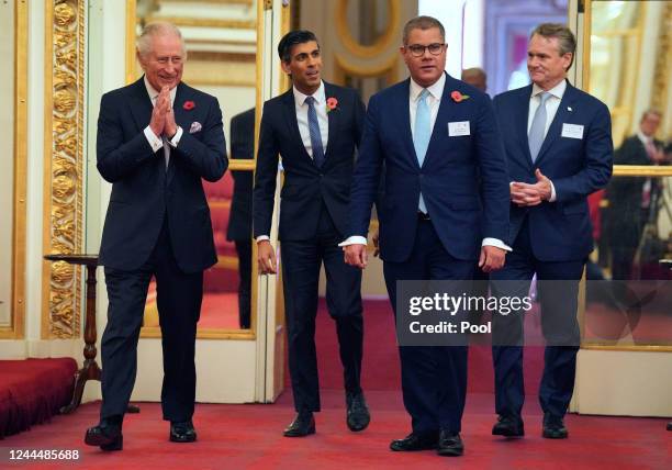 King Charles III arrives with, Prime Minister Rishi Sunak, Alok Sharma who presided over Cop26 and Brian Moynihan, Chair and CEO of Bank of America...