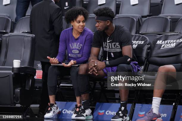 Assistant Coach Lindsey Harding and Terence Davis II of the Sacramento Kings talk prior to the game against the Miami Heat on October 29, 2022 at...