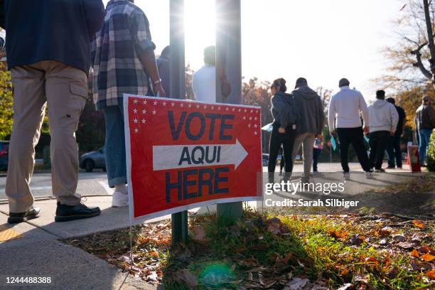 Constituents line up outside of an early voting location during the midterm election on November 4, 2022 in Woodbridge, Virginia.