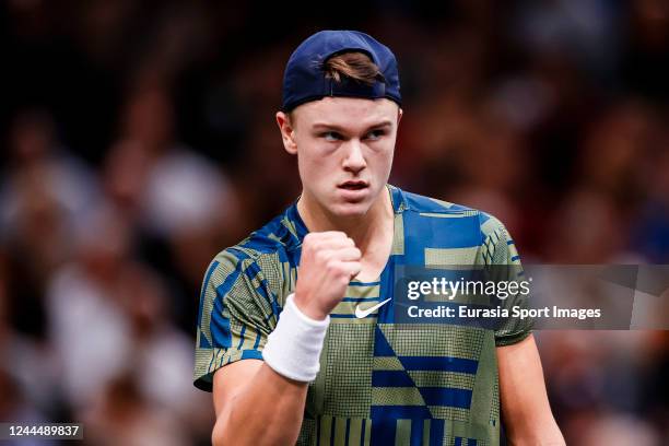 Holger Vitus Nodskov Rune of Denmark celebrates a set won against Carlos Alcaraz of Spain on the Day Five of Rolex Paris Masters at Palais Omnisports...