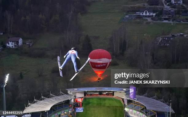 Switzerland's Sandro Hauswirth soars through the air during the qualification for the FIS Ski Jumping World Cup in Wisla, Poland on November 4, 2022.