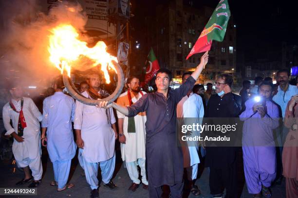 Supporters of Pakistan Tehreek-e-Insaf of Imran Khan chant anti government slogans during a protest to denounce an assassination attempt against...