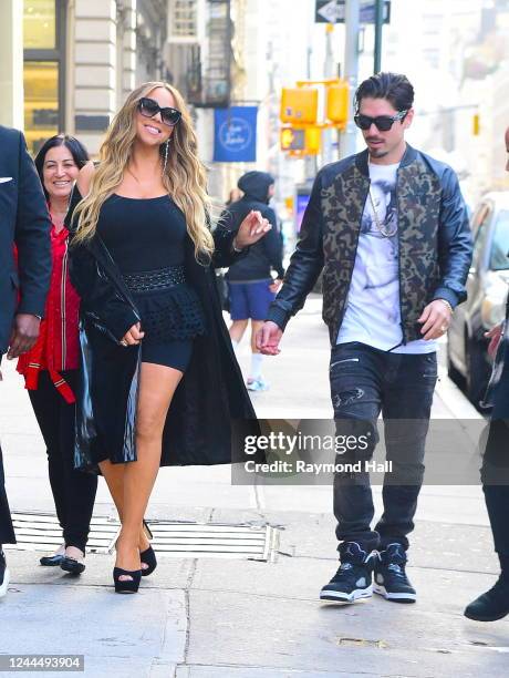Mariah Carey and Bryan Tanaka are seen walking in Soho on November 4, 2022 in New York City.