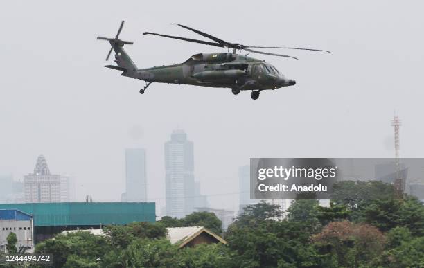 Black Hawk helicopter of the Royal Brunei Air Force performs a demonstration flight during the Indo Defence 2022 Expo & Forum defense industry...