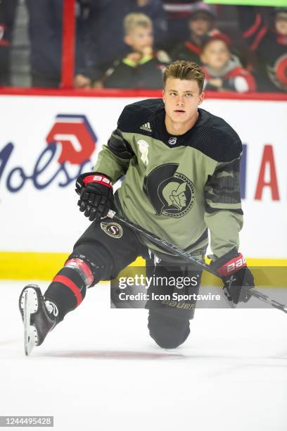 Ottawa Senators Center Tim Stutzle wears a special Canadian Armed Forces Appreciation Game jersey during warm-up before National Hockey League action...