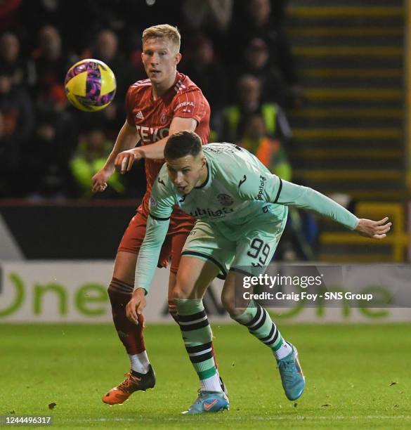 Aberdeen's Ross McCrorie and Hibs' Mykola Kukharevych during a cinch Premiership match between Aberdeen and Hibernian at Pittodrie, on November 04 in...