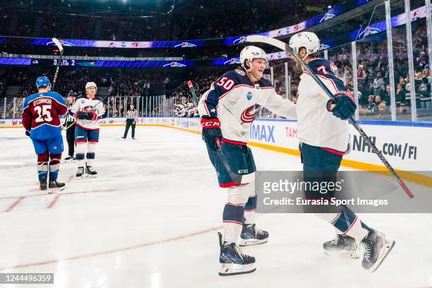 Vladislav Gavrikov of Columbus and Eric Robinson of Columbus celebrates the 3-3 during the 2022 NHL Global Series - Finland match between Columbus...
