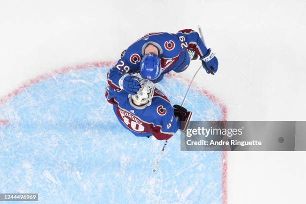 Alexandar Georgiev and Nathan MacKinnon of the Colorado Avalanche celebrate after a 6-3 win against the Columbus Blue Jackets during the 2022 NHL...