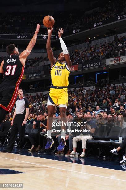 Bennedict Mathurin of the Indiana Pacers shoots a three point basket during the game against the Miami Heat on November 4, 2022 at Gainbridge...