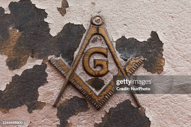 The Square and Compasses symbol located on a plinth of the Statue of Liberty New York Bay in New York, United States, on October 25, 2022.