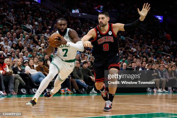 Jaylen Brown of the Boston Celtics drives past Nikola Vucevic of the Chicago Bulls during the second quarter of the game at TD Garden on November 4,...