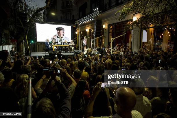 Spaniard singer-songwriter Joan Manuel Serrat speaks during the inauguration of the "Paseo Fontanarrosa-Serrat" at the corner of El Cairo bar in...