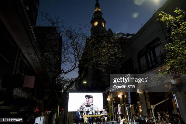 Spaniard singer-songwriter Joan Manuel Serrat speaks during the inauguration of the "Paseo Fontanarrosa-Serrat" at the corner of El Cairo bar in...