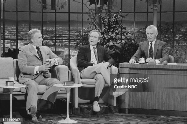 Pictured: Announcer Ed McMahon and TV personality Dick Cavett during an interview with host Johnny Carson on October 28, 1981 --