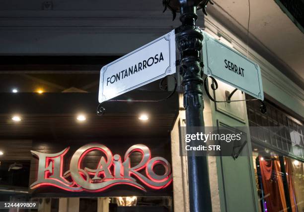 Street signs reading Fontanarros-Serrat are seen outside El Cairo bar in downtown Rosario, Argentina, during the inauguration of "Paseo...