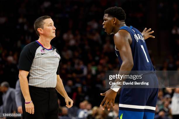 Anthony Edwards of the Minnesota Timberwolves reacts to a call with referee Nick Buchert in the third quarter of the game against the Milwaukee Bucks...