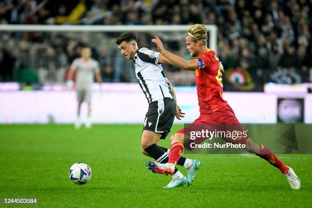 Udinese's Lazar Samardzic in action against Lecce's Morten Hjulmand during the italian soccer Serie A match Udinese Calcio vs US Lecce on November...
