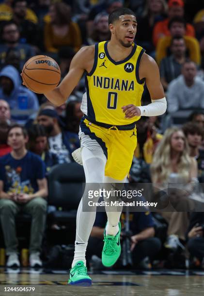 Tyrese Haliburton of the Indiana Pacers brings the ball up court during the game against the Miami Heat at Gainbridge Fieldhouse on November 4, 2022...