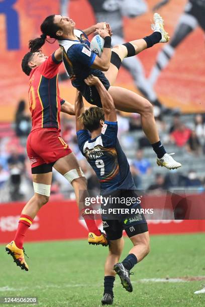 Spain's Manu Moreno challenges Japan's Shotaro Tsuoka on the second day of the Hong Kong Sevens rugby tournament on November 5, 2022.