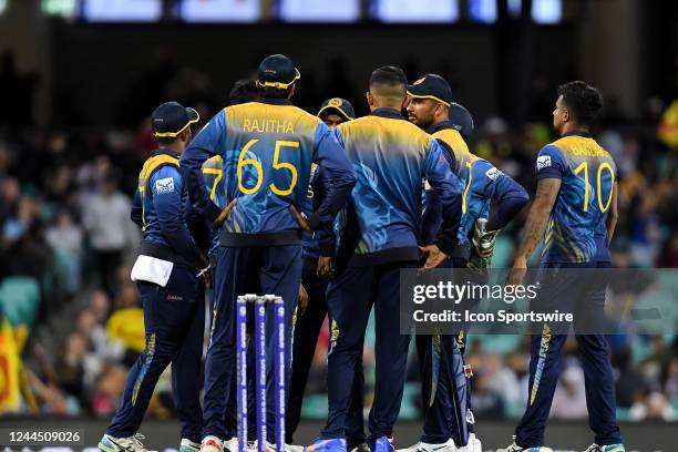 Sri Lanka celebrate the wicket of Moeen Ali of England during the ICC Men's T20 World Cup cricket match between England v Sri Lanka at The Sydney...