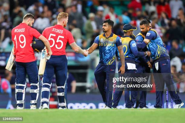 Englands Ben Stokes and teammate Chris Woakes shake hands with players from Sri Lanka after winning the ICC men's Twenty20 World Cup 2022 cricket...