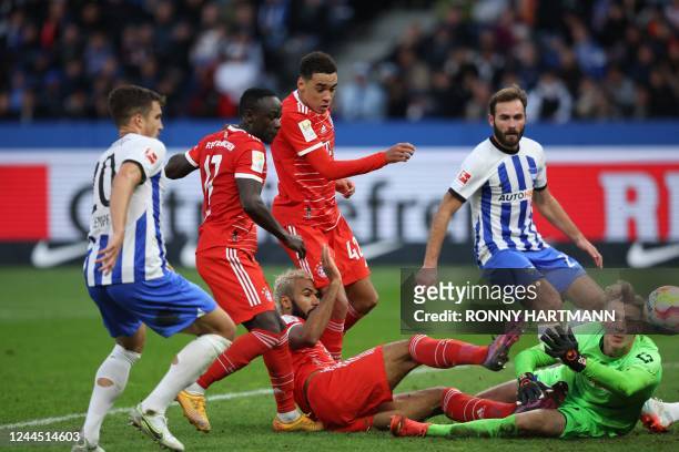Bayern Munich's Cameroonian forward Eric Maxim Choupo-Moting scores his team's third goal during the German first division Bundesliga football match...