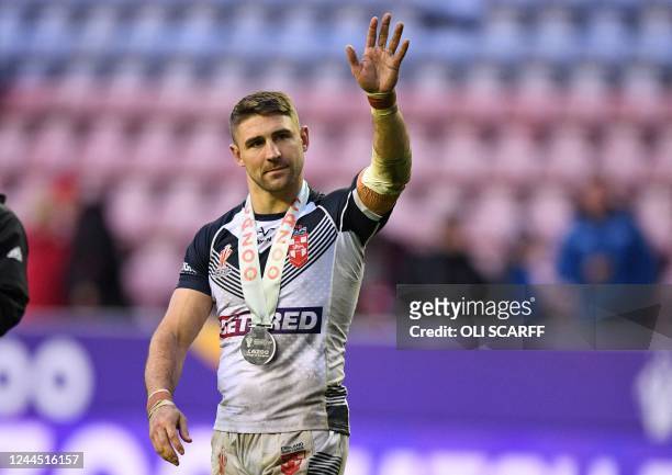Man of the match England's Tommy Makinson waves to the fans after the 2021 rugby league World Cup men's Quarter Final match between England and Papua...