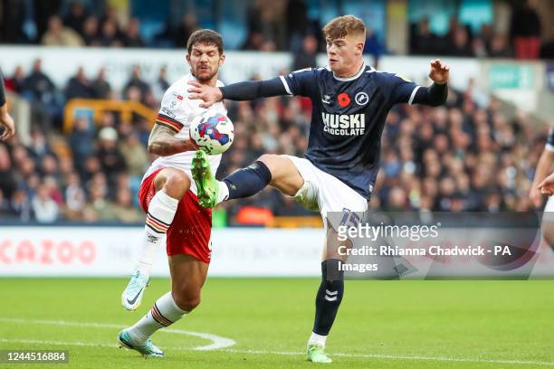 Millwall's Charlie Cresswell takes a touch during the Sky Bet Championship match at The Den, London. Picture date: Saturday November 5, 2022.