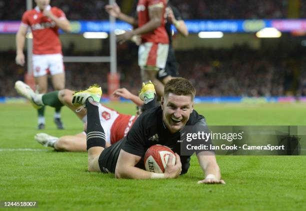 New Zealand's Jordie Barrett celebrates scoring his side's seventh try during the Autumn International match between Wales and New Zealand at...