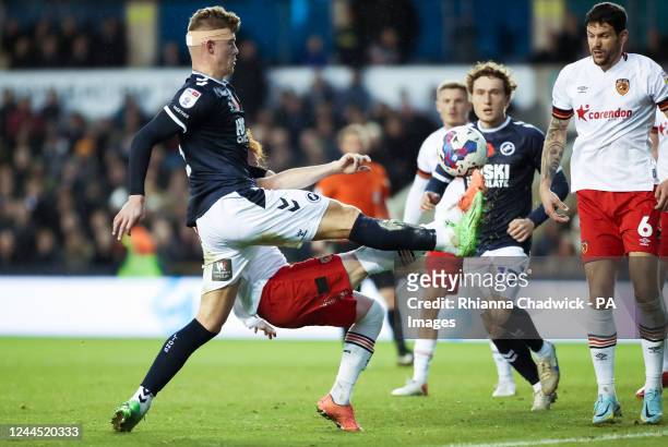 Millwall's Charlie Cresswell battles for the ball against Hull City's Ryan Woods during the Sky Bet Championship match at The Den, London. Picture...