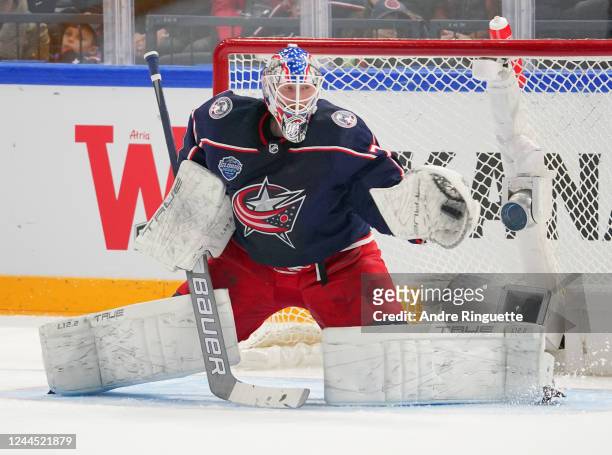 Joonas Korpisalo of the Columbus Blue Jackets makes a save against the Colorado Avalanche during the 2022 NHL Global Series Finland at Nokia Arena on...