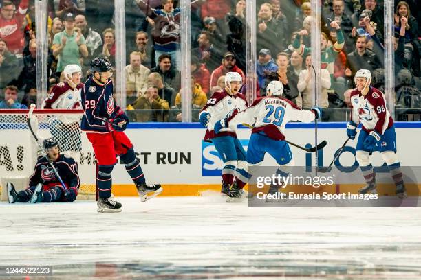 Artturi Lehkonen of Colarado celebrated by Nathan MacKinnon of Colarado and Mikko Rantanen of Colarado for his goal during the 2022 NHL Global Series...