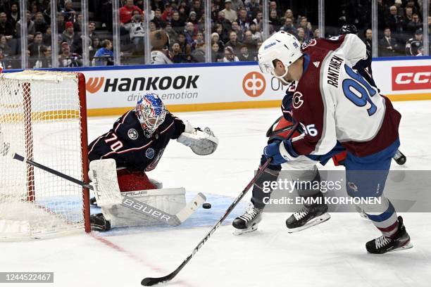 Columbus Blue Jackets' goalkeeper Joonas Korpisalo saves against Colorado Avalanche'S Mikko Rantanen during the 2022 NHL Global Series ice hockey...