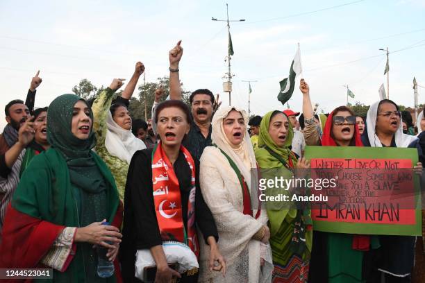 Supporters of former Pakistani Prime Minister Imran Khan's party, 'Pakistan Tehreek-e-Insaf' chant slogans during a protest to condemn a shooting...