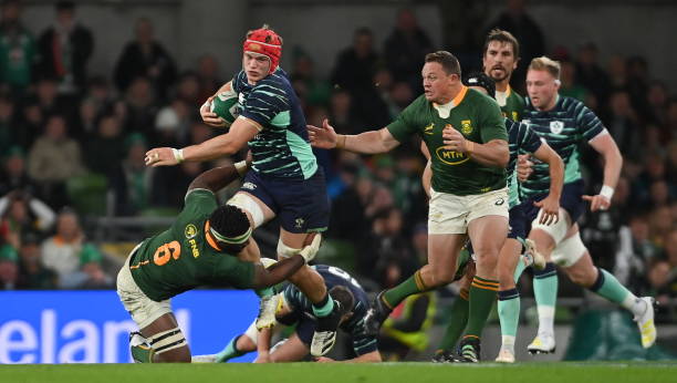 Dublin , Ireland - 5 November 2022; Josh van der Flier of Ireland is tackled by Siya Kolisi of South Africa during the Bank of Ireland Nations Series match between Ireland and South Africa at the Aviva Stadium in Dublin. (Photo By Ramsey Cardy/Sportsfile via Getty Images)