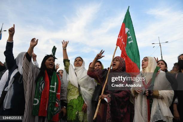 Supporters of former Pakistani Prime Minister Imran Khan's party, 'Pakistan Tehreek-e-Insaf' chant slogans during a protest to condemn a shooting...
