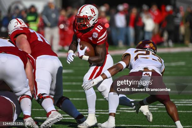 Running back Anthony Grant of the Nebraska Cornhuskers runs against the Minnesota Golden Gophers during the first quarter at Memorial Stadium on...