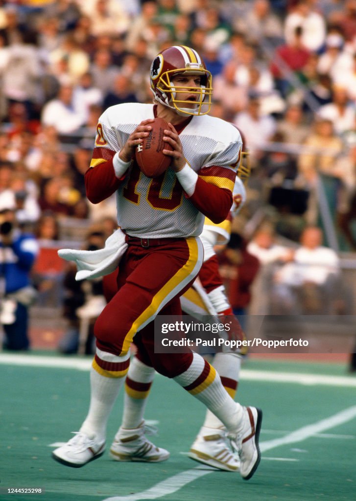 Ed Rubbert Washington Redskins quarterback Jay Schroeder looks for a pass during ...