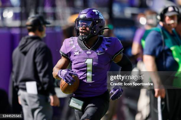 Horned Frogs cornerback Tre'Vius Hodges-Tomlinson trots to the end zone after making an interception during the game between the TCU Horned Frogs and...