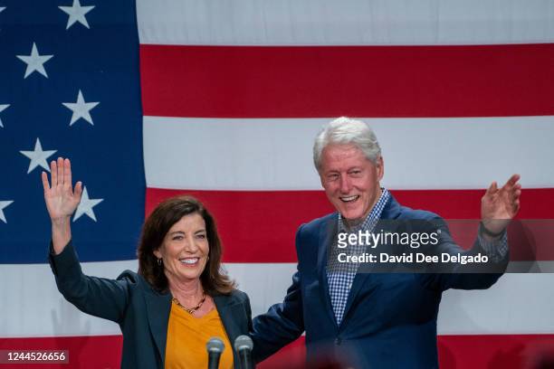 Gov. Kathy Hochul greets Former President Bill Clinton on stage at a Get Out The Vote rally on November 5, 2022 in New York City. Former President...