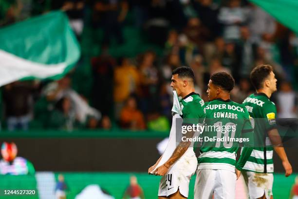 Pedro Porro of Sporting CP celebrates after scoring his team's first goal with teammates during the Liga Portugal Bwin match between Sporting CP and...