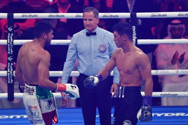 Dmitry Bivol greets Gilberto Ramirez after their WBA Light-Heavyweight World Title boxing match at the Etihad Arena in Abu Dhabi on November 5, 2022.