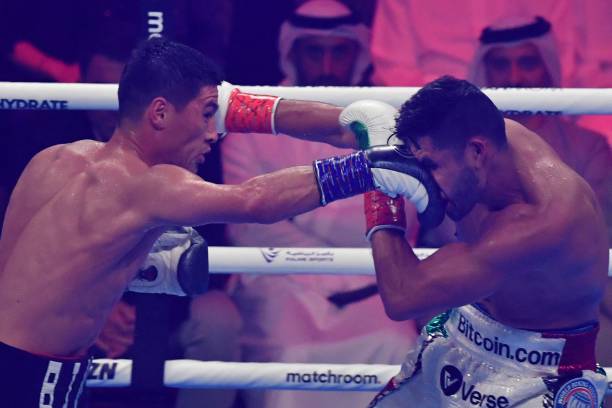 Dmitry Bivol competes with Gilberto Ramirez during their WBA Light-Heavyweight World Title boxing match at the Etihad Arena in Abu Dhabi on November...